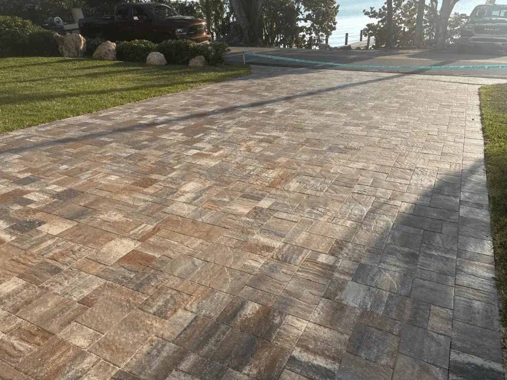 Rustic multicolor slate-look paver driveway sealed at a waterfront Brevard County, Florida home