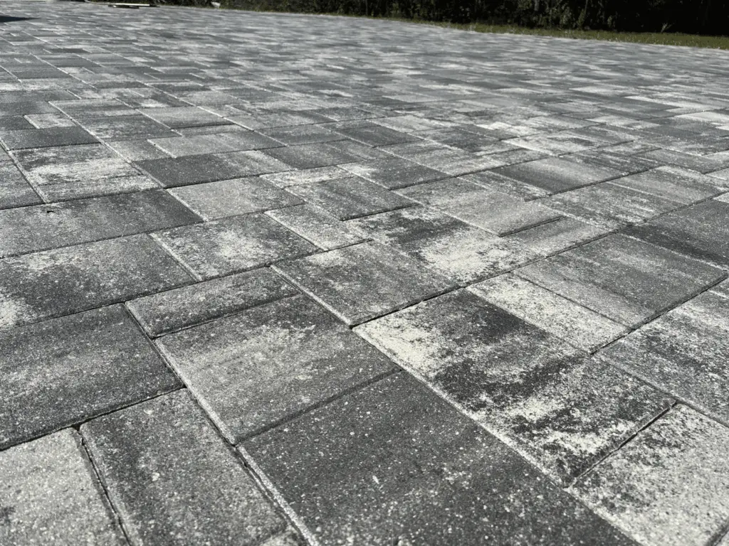 Pressure washing sealed pavers in Brevard County, Florida by Rising Tide Paver Sealing