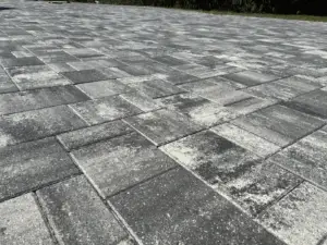 Pressure washing sealed pavers in Brevard County, Florida by Rising Tide Paver Sealing